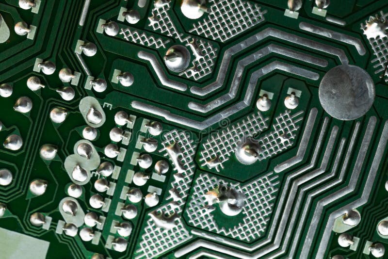 Sfondo astratto di alta tecnologia con circuito stampato verde immagini stock