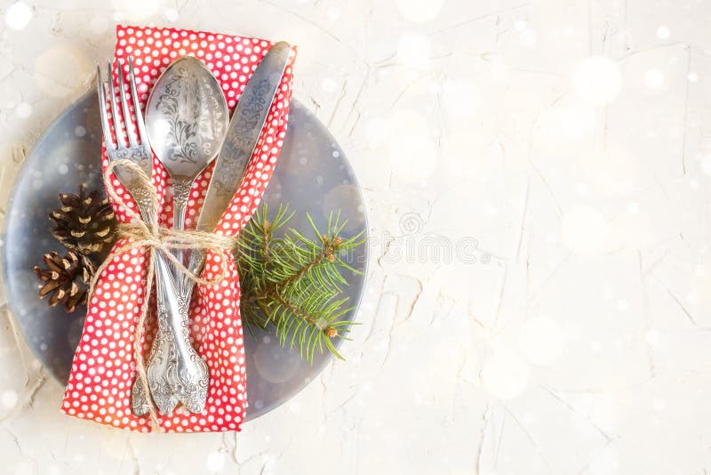 Christmas menu background with fork knife napkin and fir tree brunch on white table. Copy space, top view. Toned bokeh and snow, food, setting, holiday, dinner, cutlery, plate, decor, decoration, celebration, ornament, dish, festive, event, xmas, silverware, winter, place, party, restaurant, new, year, red, decorative, branch, empty, rustic, tableware, home, celebrate, dishware, meal, kitchen, design, lunch. Christmas menu background with fork knife napkin and fir tree brunch on white table. Copy space, top view. Toned bokeh and snow, food, setting, holiday, dinner, cutlery, plate, decor, decoration, celebration, ornament, dish, festive, event, xmas, silverware, winter, place, party, restaurant, new, year, red, decorative, branch, empty, rustic, tableware, home, celebrate, dishware, meal, kitchen, design, lunch