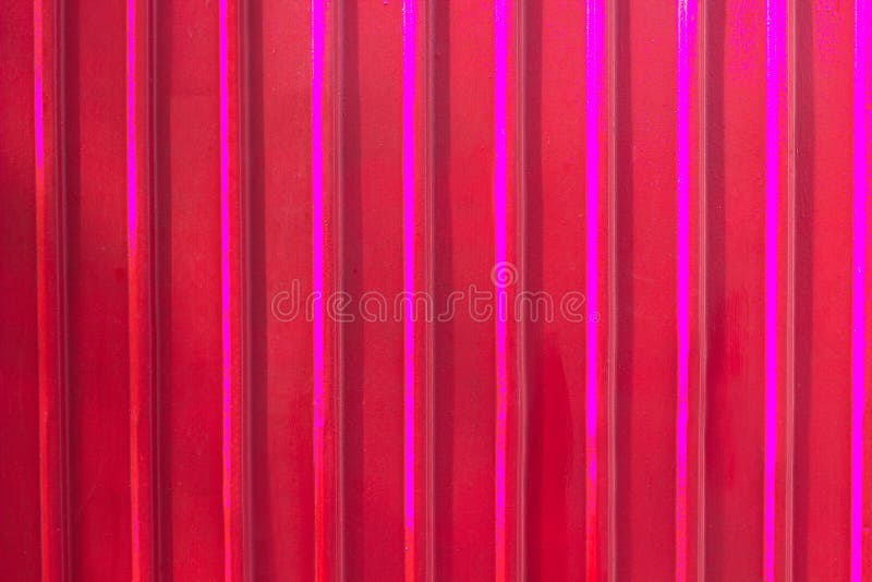 Pink metal shutter door background. Pink garage gate, metal material, steel, multi colored. Pink metal shutter door background. Pink garage gate, metal material, steel, multi colored