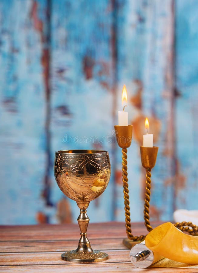 Shabbat challah bread wine and candles on wooden table. Shabbat challah bread, shabbat wine and candles on Prayer Shawl Tallit jewish religious symbol, shalom stock image Shabbat challah bread wine and candles on wooden table. Shabbat challah bread, shabbat wine and candles on Prayer Shawl Tallit jewish religious symbol, shalom stock image
