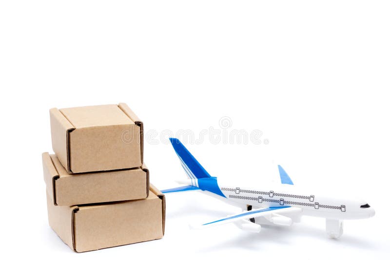 Airplane and Stack of Cardboard Boxes. Concept of Air Cargo and Parcels