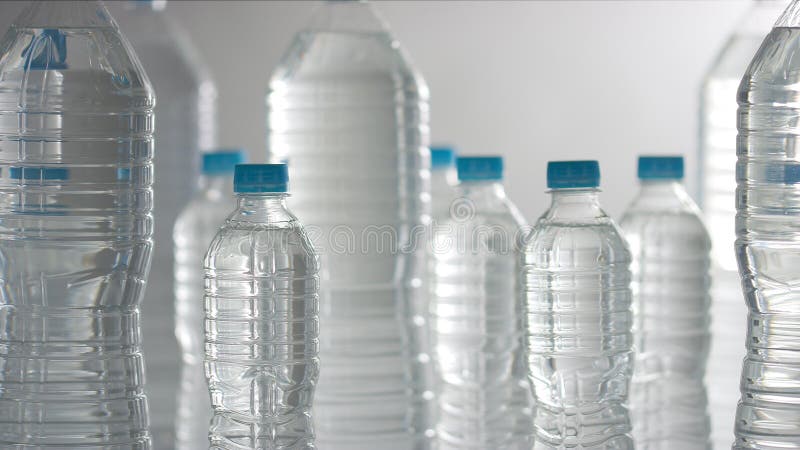 Shadow play in many small and big plastic bottles of mineral water