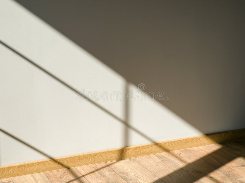 The Shadow from the Window Falling on the Wall and Floor of Wooden