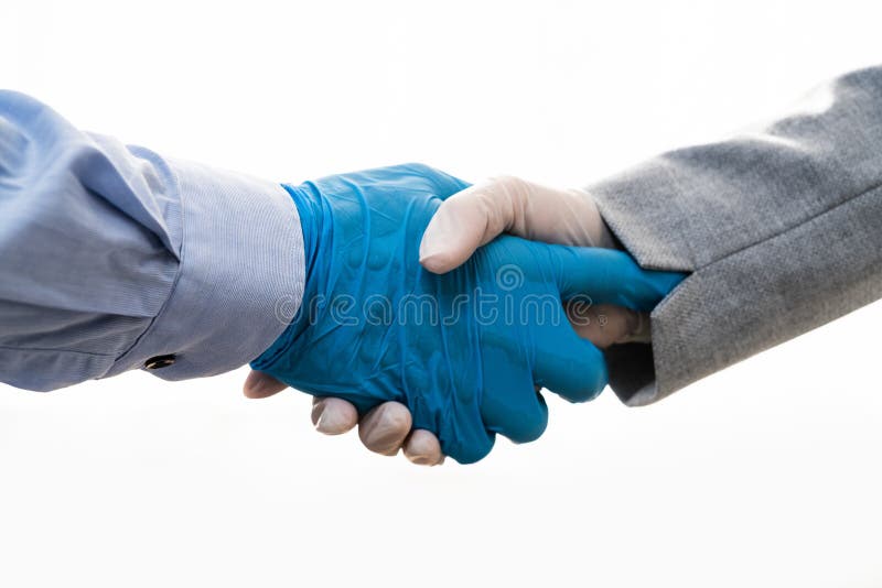Shaking Hands in Gloves stock photo. Image of adult 176613258