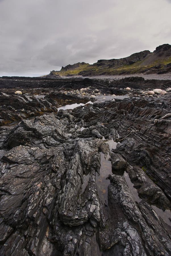 Shale rocks on the Arctic Coast, Cape Kekursky, Kola peninsula, Russia.