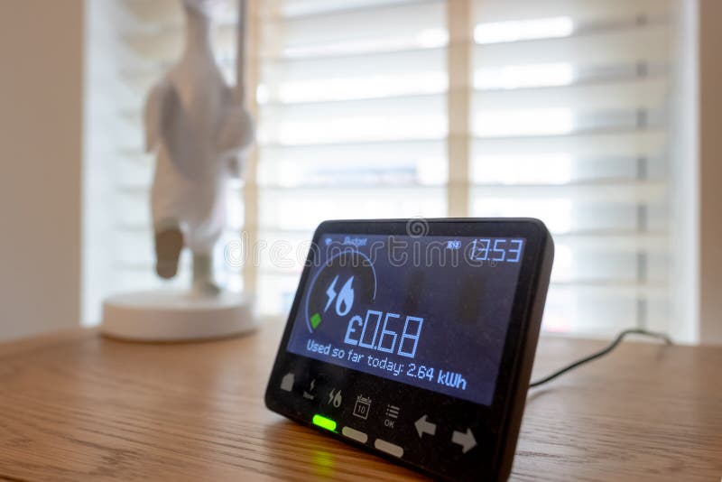 Shallow focus of a dusty digital smart meter showing the amount of used electricity. royalty free stock photography