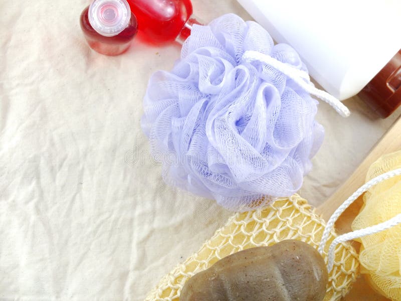 Shampoo and Shower Gel with Bath Puff and Loofah Spa Kit Top View Stock