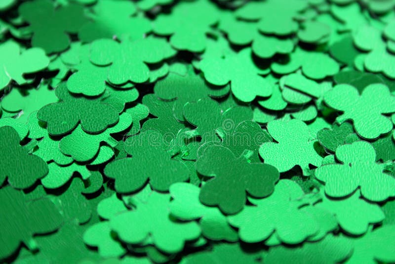 Shiney Green Shamrock Confetti background