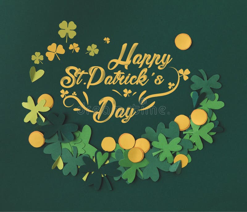 Shamrocks and coins with happy st patricks day lettering stock images Shamrocks and coins with happy st patricks day lettering stock images