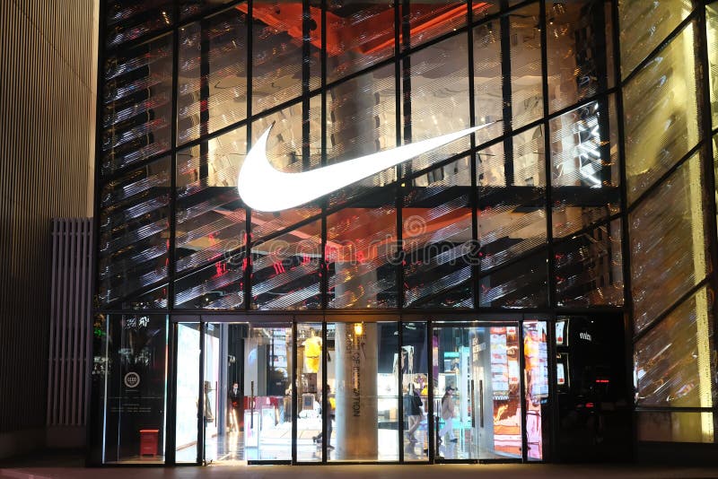 Facade of Large NIKE Flagship Store at Night Editorial Photo - Image of ...