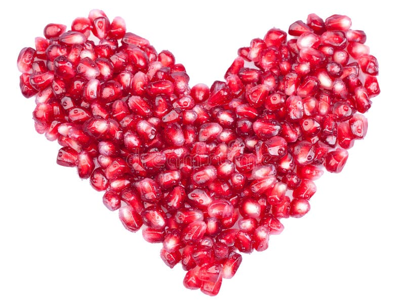 Shape of a heart made out of pomegranate seeds