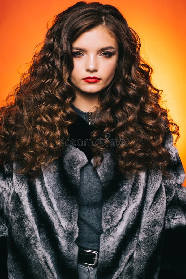 Shaping Curly Hair. Young Woman with Long Locks of Hair. Pretty Girl with Curly Hairstyle Stock Image - Image of beauty, curl: 148546905 Shaping Curly Hair. Young Woman with Long Locks of Hair. Pretty Girl with Curly Hairstyle Stock Image - Image of beauty, curl: 148546905