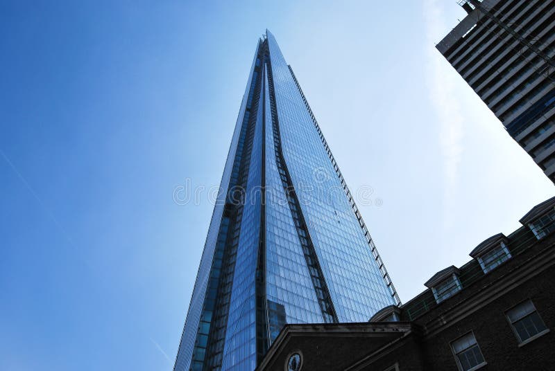 The Shard looms over traditional London buildings