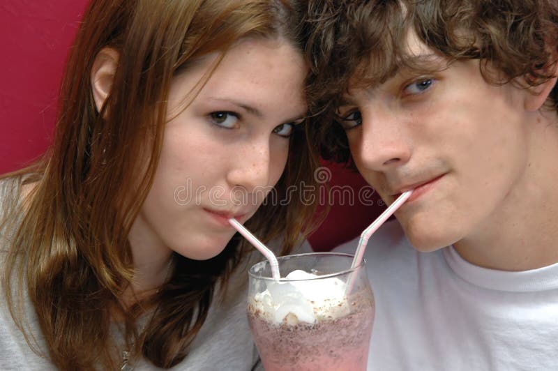 Sharing a sip royalty free stock photo