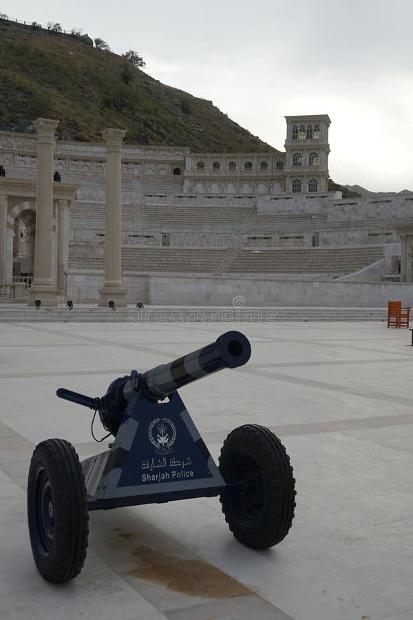A Sharjah Police cannon is installed in the square in front of the Khor Fakkan Amphitheater in April. Khor Fakkan, Sharjah, UAE. stock images