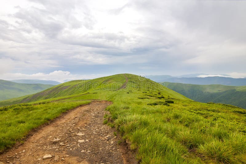 Sharp Green Mountain Peaks and Sky with Dramatic Clouds Landscape Stock Image Image of