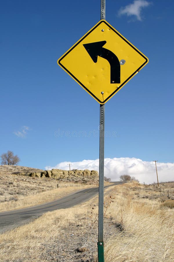 Sharp Left Turn Sign