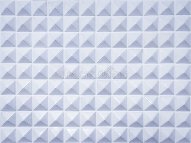 Sharp pyramidal elements geometric textured. Plastic sharp pyramidal background. Sharp pyramidal elements geometric texture or background