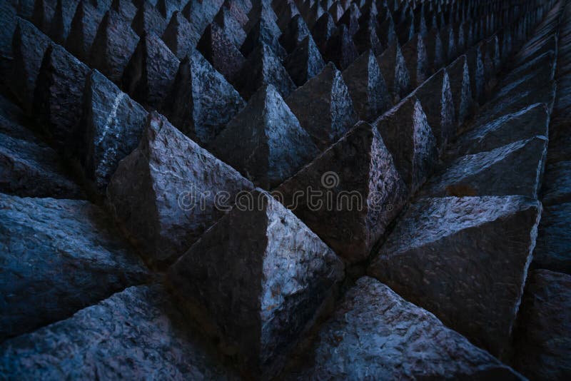 Sharp tip concrete architecture texture background. Art picture of unique pattern of dark stone carving in pointed triangle shape. stock photography Sharp tip concrete architecture texture background. Art picture of unique pattern of dark stone carving in pointed triangle shape. stock photography