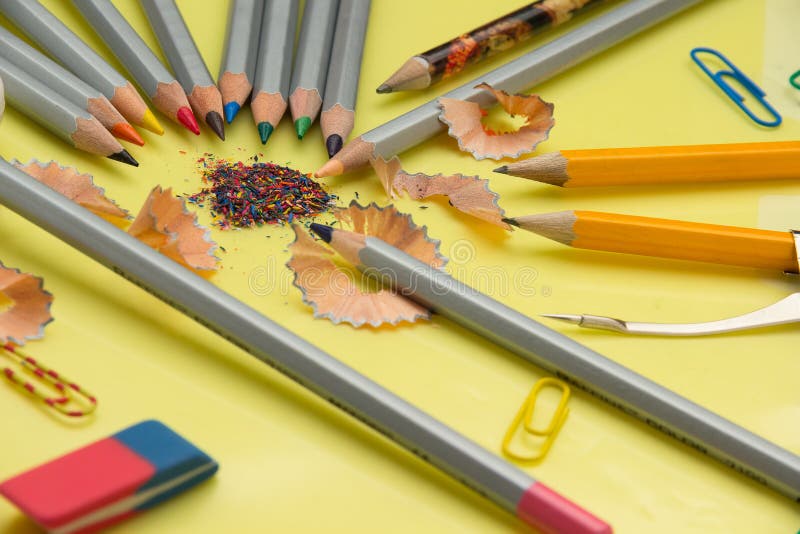 Sharpened Pencil, Eraser, Compass, Paper Clips on Yellow Backg Stock Photo Image of notebook