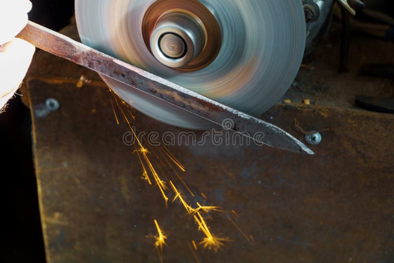 Sharpening Circular Saw, worker fabrication knife sharpener a circular saw blade stock photos Sharpening Circular Saw, worker fabrication knife sharpener a circular saw blade stock photos