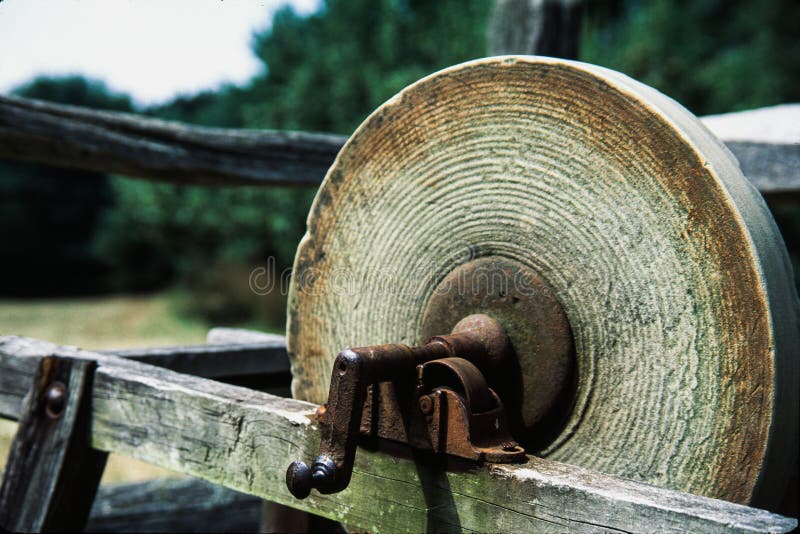 An Old Whetstone For Sharpening Knives Grinding Wheel On An Old Tripod  Stock Photo - Download Image Now - iStock