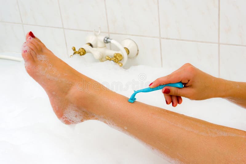 Shaving her legs stock image. Image of smooth, care, cosmetic 34294249