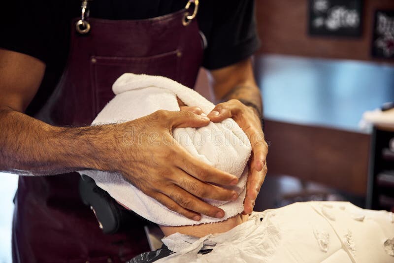 Shaving Process of Beards in Master Makes the Client Shave His Beard with Vintage