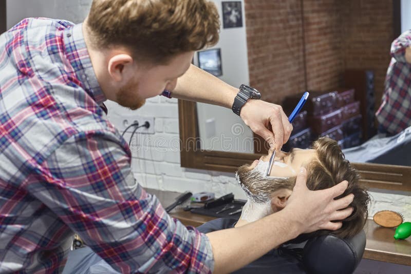 Shaving with Straight Razor in the Barber Shop Stock Image Image of