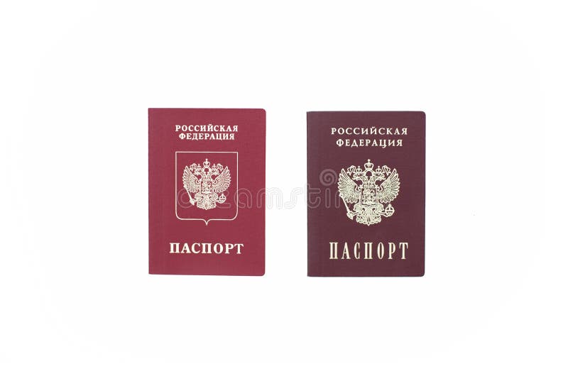 Shchelkovo, Российская Федерация - 9-ое марта 2019: Паспорт 2 паспортов чужой и национальный паспорт Российской Федерации стоковая фотография rf Shchelkovo, Российская Федерация - 9-ое марта 2019: Паспорт 2 паспортов чужой и национальный паспорт Российской Федерации стоковая фотография rf