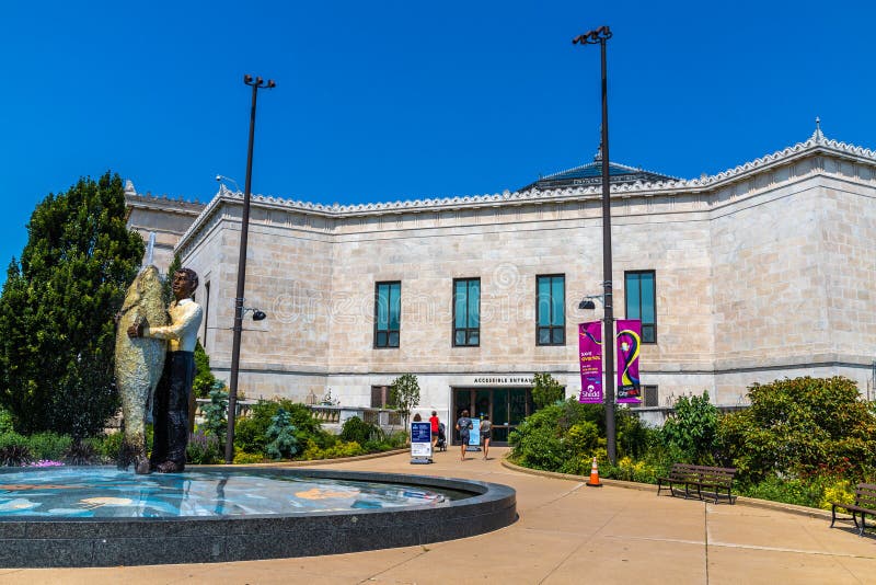 Shedd Aquarium in Chicago. CHICAGO, USA - MARCH 29, 2020: Man With Fish statue next to Shedd Aquarium building in Chicago, Illinois, USA royalty free stock images Shedd Aquarium in Chicago. CHICAGO, USA - MARCH 29, 2020: Man With Fish statue next to Shedd Aquarium building in Chicago, Illinois, USA royalty free stock images