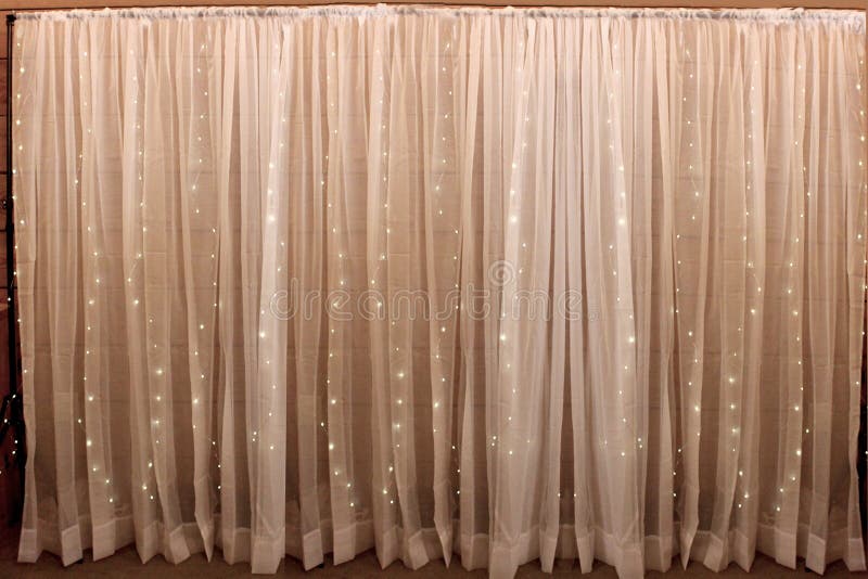 Sheer Curtains with Lights stock photo. Image of room 217062422