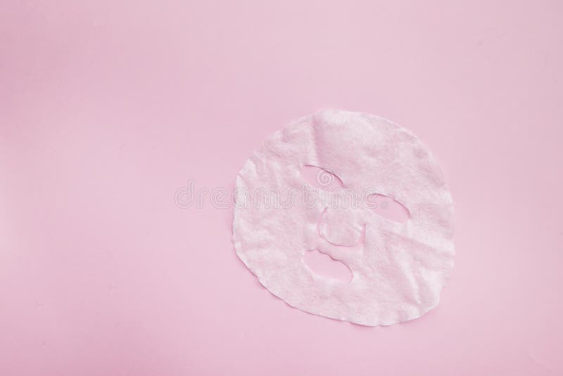 Download Sheet Facial Mask On Pastel Pink Paper Background. Skin ...