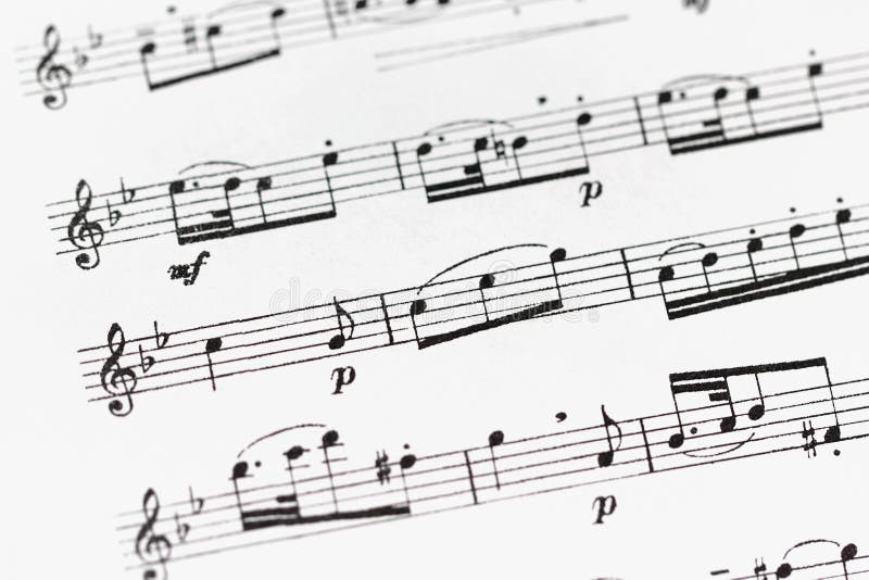Macro of sheet music with treble clef, notes and with a designation volume p (piano) - quiet. Paper notation stock images, royalty-free photos and pictures