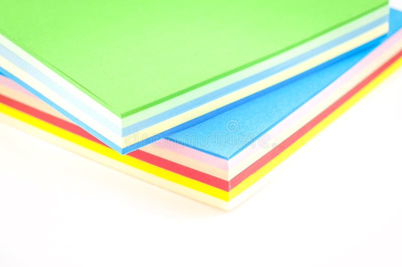 Sheets of Colored Paper on a White Background Isolated Stock Image