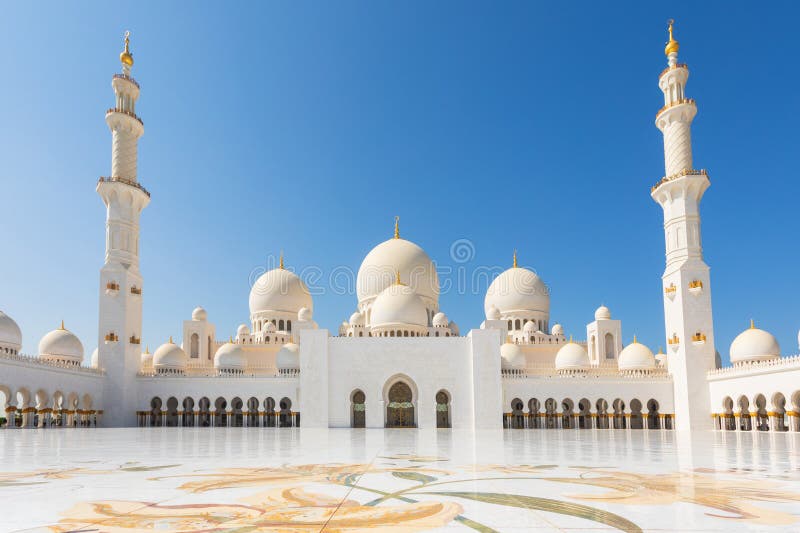 Sheikh Zayed Mosque - Abu Dhabi, United Arab Emirates. Beautiful white Grand Mosque courtyard royalty free stock images Sheikh Zayed Mosque - Abu Dhabi, United Arab Emirates. Beautiful white Grand Mosque courtyard royalty free stock images