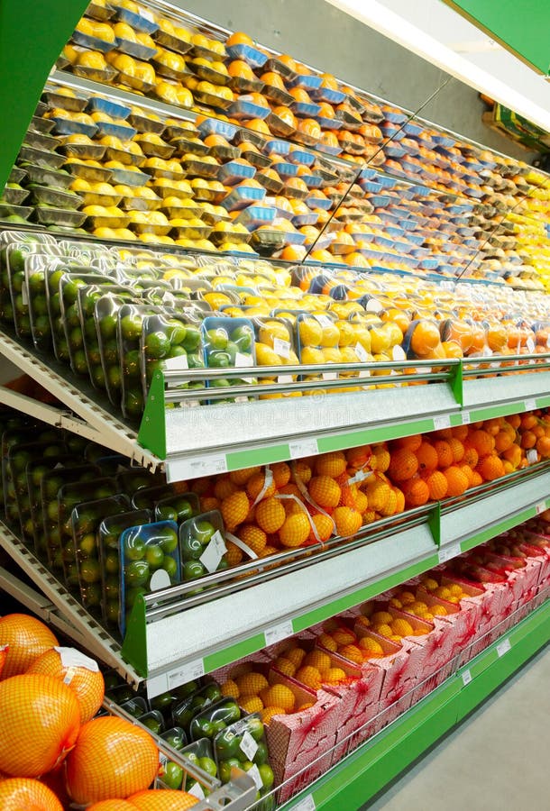 Shelf with fruits stock photos