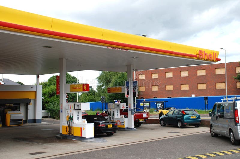Shell petrol filling station. Exterior of a Shell petrol filling station at Ashford in Kent, England on June 17, 2008. Royal Dutch Shell reported a 90% increase stock photo Shell petrol filling station. Exterior of a Shell petrol filling station at Ashford in Kent, England on June 17, 2008. Royal Dutch Shell reported a 90% increase stock photo