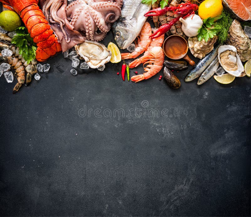 Shellfish plate of crustacean seafood with fresh lobster, mussels, oysters as an ocean gourmet dinner background