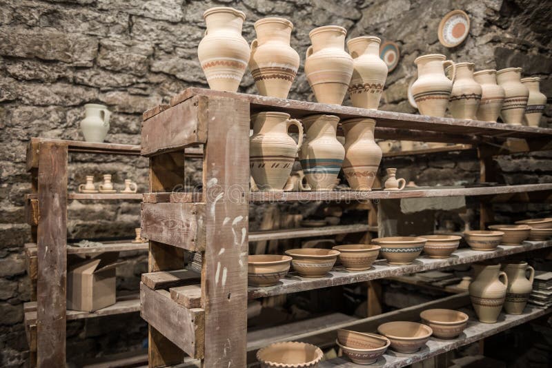 Shelves with pottery stock image. Image of bowl, design 60843663