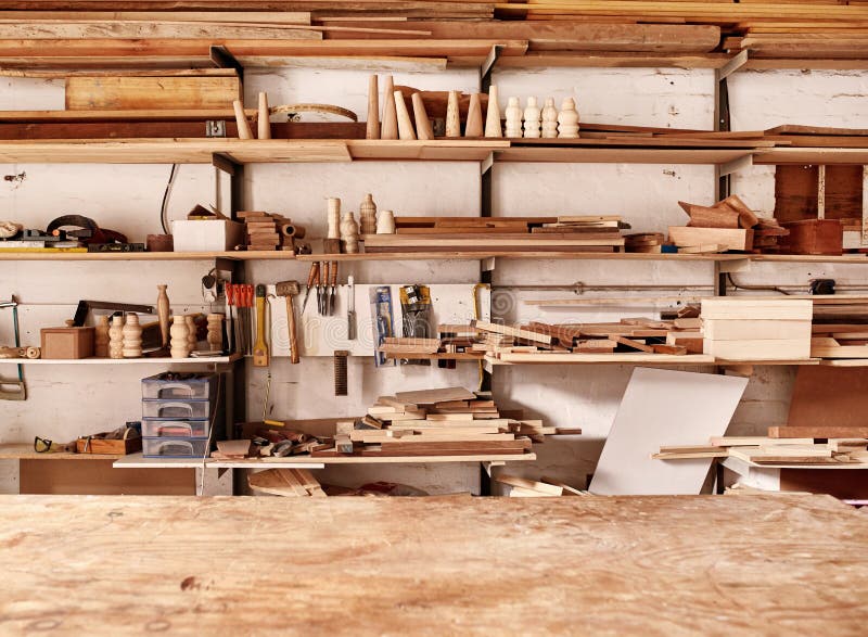 Shelves in woodwork workshop with various wooden items and tools