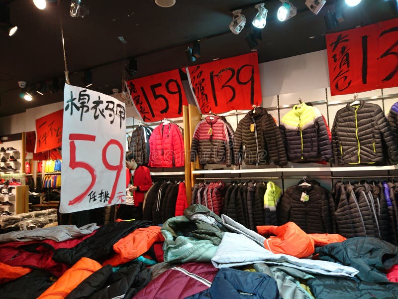 Shenzhen, China: Clothing Stores Sell Clothes at a Loss at the End of ...