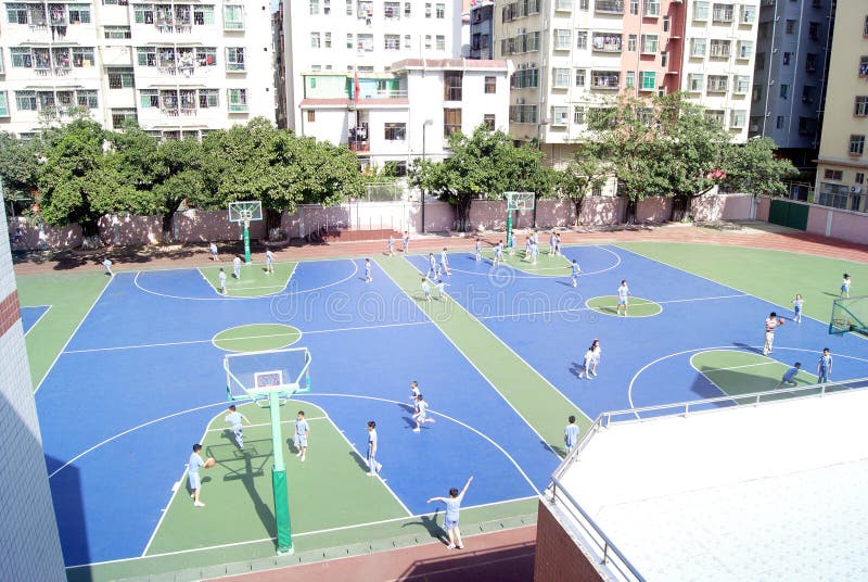 Shenzhen china: students are playing basketball stock photos