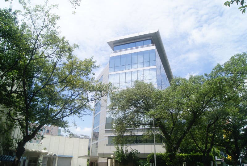 Shenzhen Shekou Industrial Zone, industrial landscape, in the green trees in the environment. Shenzhen Shekou Industrial Zone, industrial landscape, in the green trees in the environment.