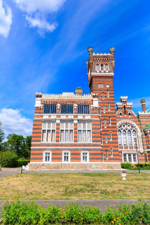 Sheremetev castle palace and park ensemble in the village of Yurino on the bank of the Volga, combination of different architectural styles in one building. Cloudy weather at the beginning of summer. Different color styles stock images, royalty-free photos and pictures