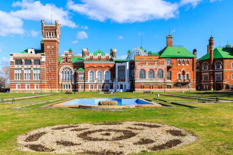 Sheremetev castle palace and park ensemble in the village of Yurino on the bank of the Volga, combination of different architectural styles in one building. Cloudy weather at the beginning of summer. Different color styles stock images, royalty-free photos and pictures