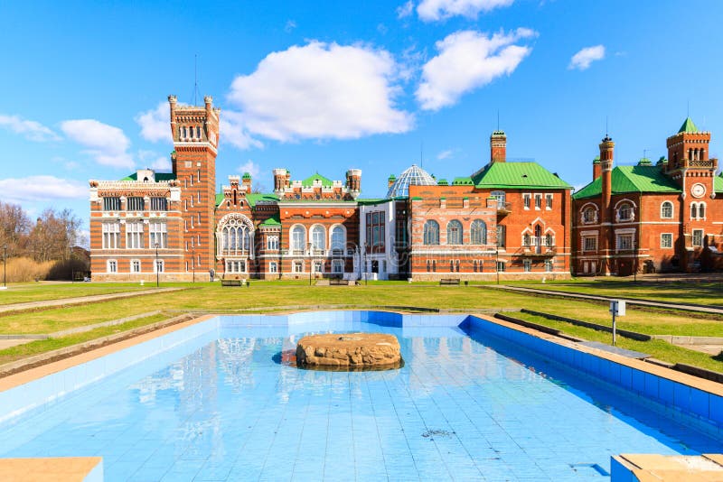 Sheremetev castle palace and park ensemble in the village of Yurino on the bank of the Volga, combination of different architectural styles in one building. Cloudy weather at the beginning of summer. Different color styles stock images, royalty-free photos and pictures