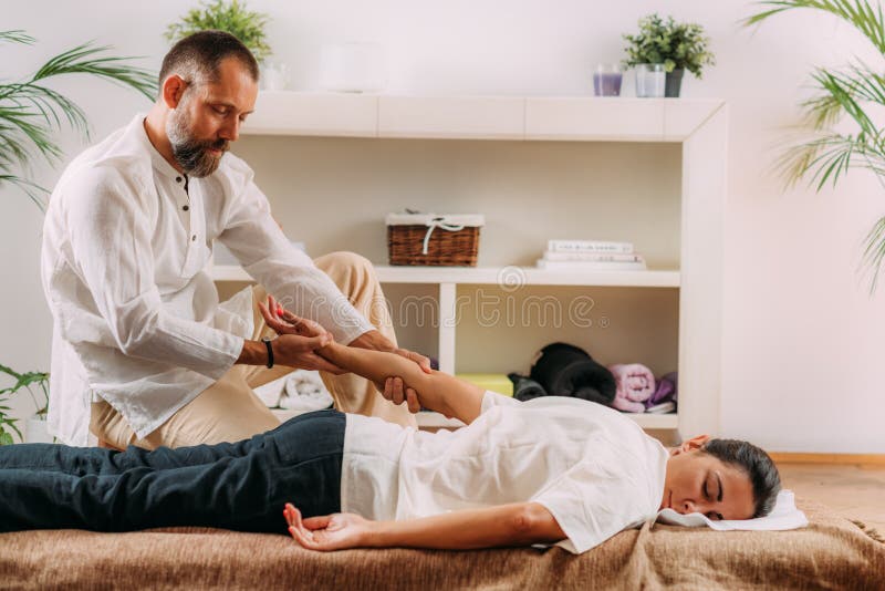 Premium Photo  Heart meridian shiatsu massage