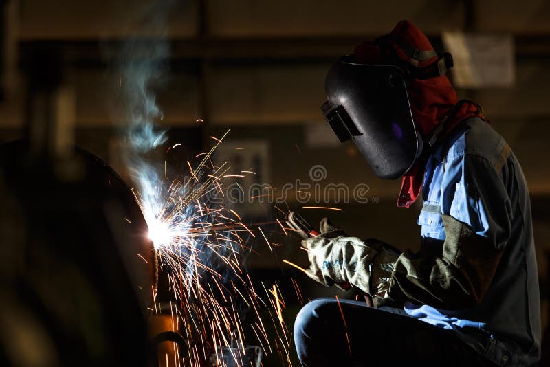 Shielded metal arc welding stock photo. Image of industry - 63881550