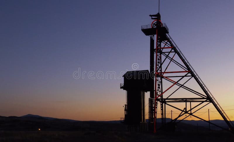 Shilouettes da mineração fotografia de stock Shilouettes da mineração fotografia de stock